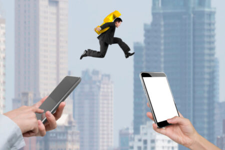 Man jumping over phones