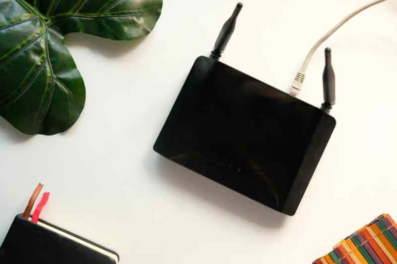 Black internet router on the table